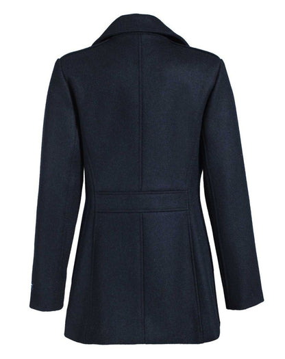 Achterkant van de getailleerde Detroit peacoat voor dames van Dalmard Marine met gouden messing knopen.